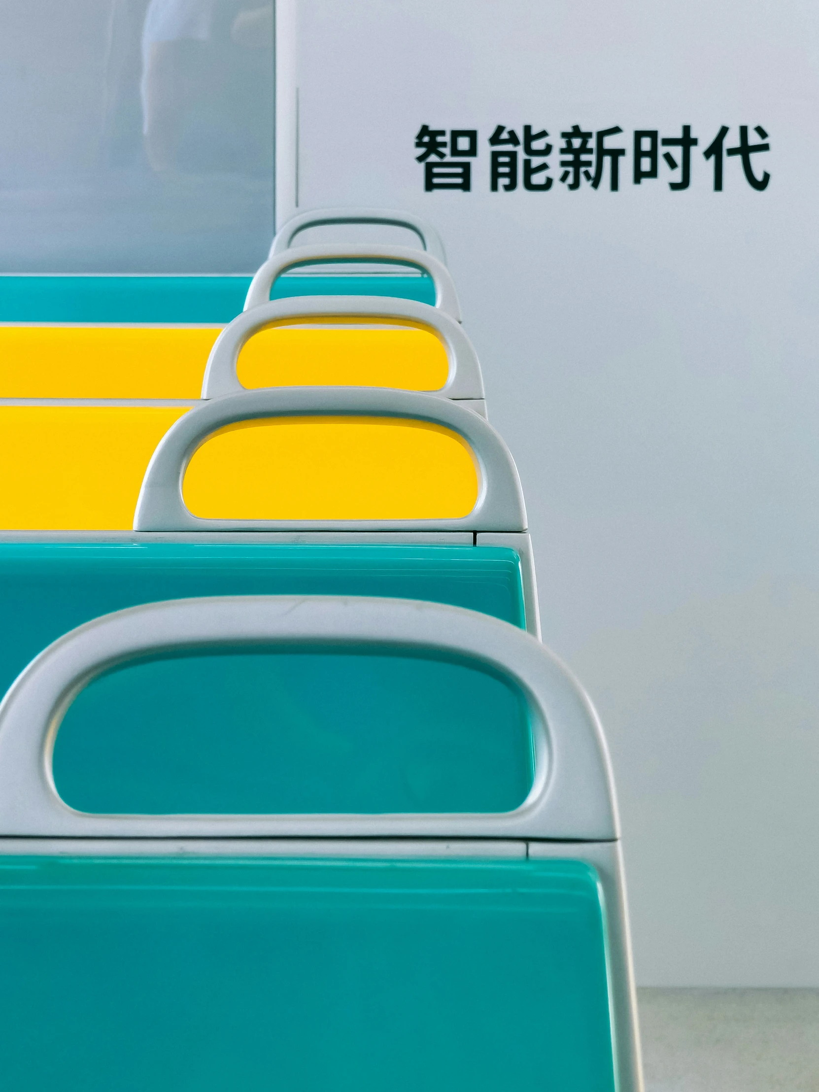 several rows of chairs with chinese writing on them