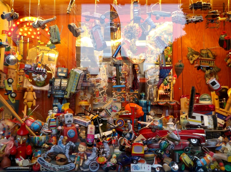 a window display with many different types and sizes of items