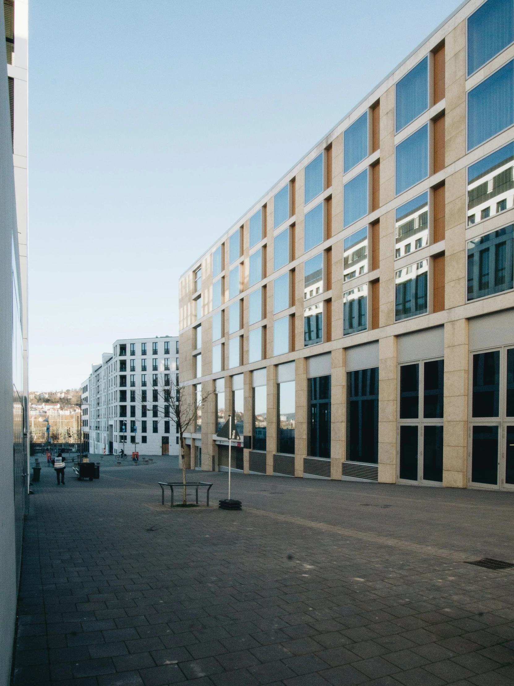 a view from the outside of a building, with a view of the ground