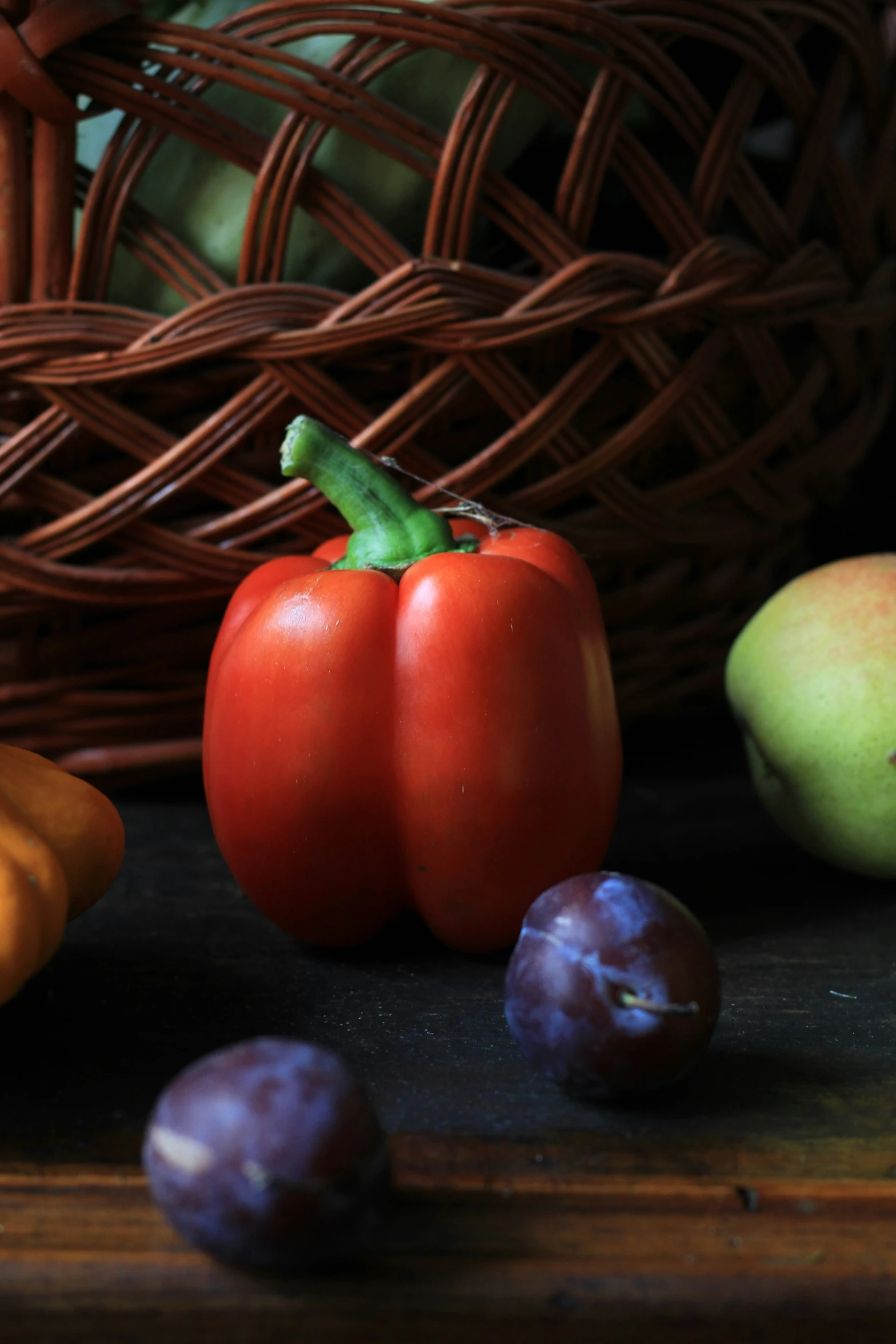 a bunch of vegetables that are on top of a wooden table