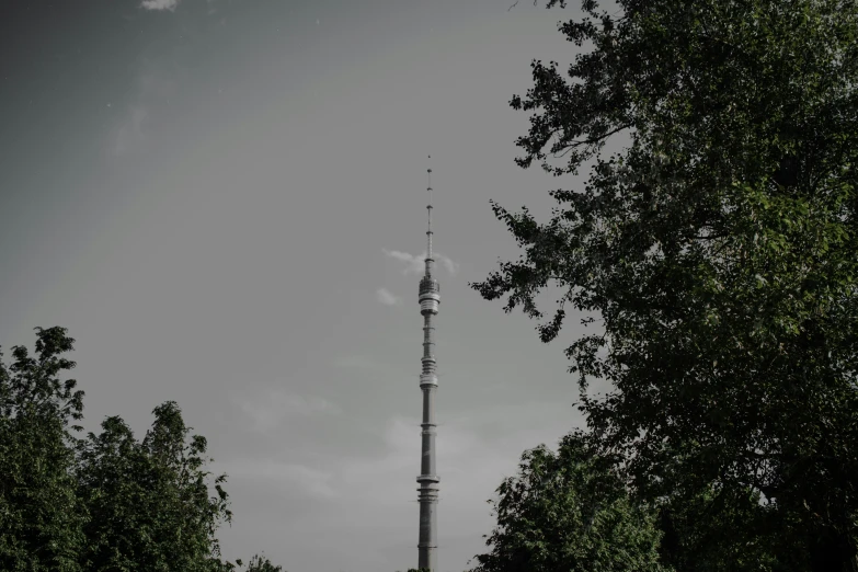 a very tall structure sitting among some trees