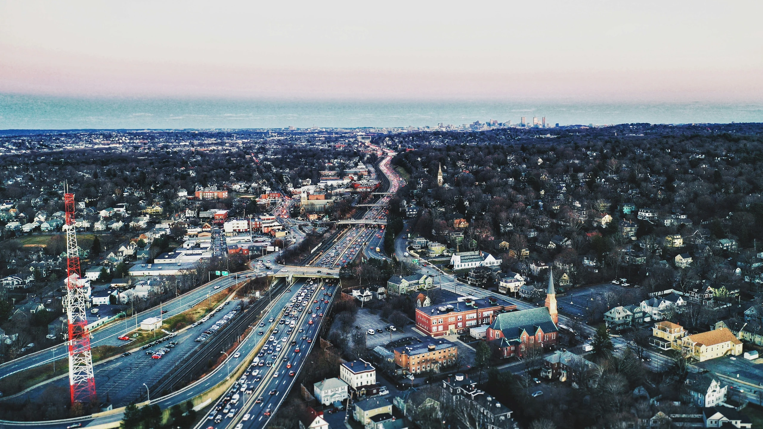 a large city is shown with many road curves