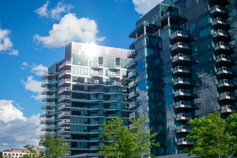 an unusual looking building with many windows and balconies