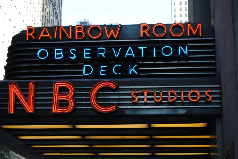 a neon sign with the name of an indoor play area