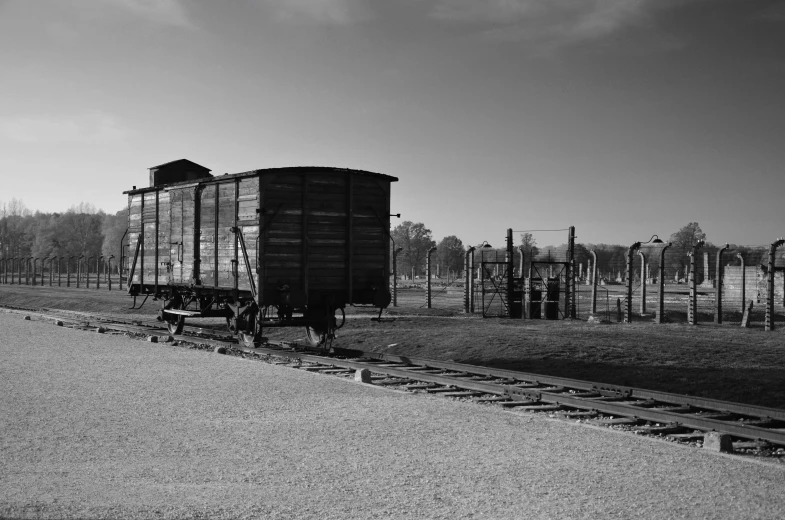 two train cars sitting next to each other