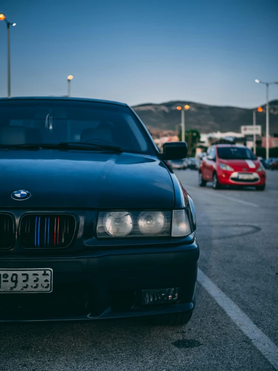 an image of a bmw with the license plate of its cars