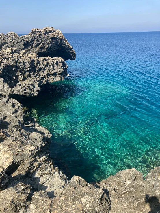 there are very clear blue water near the ocean