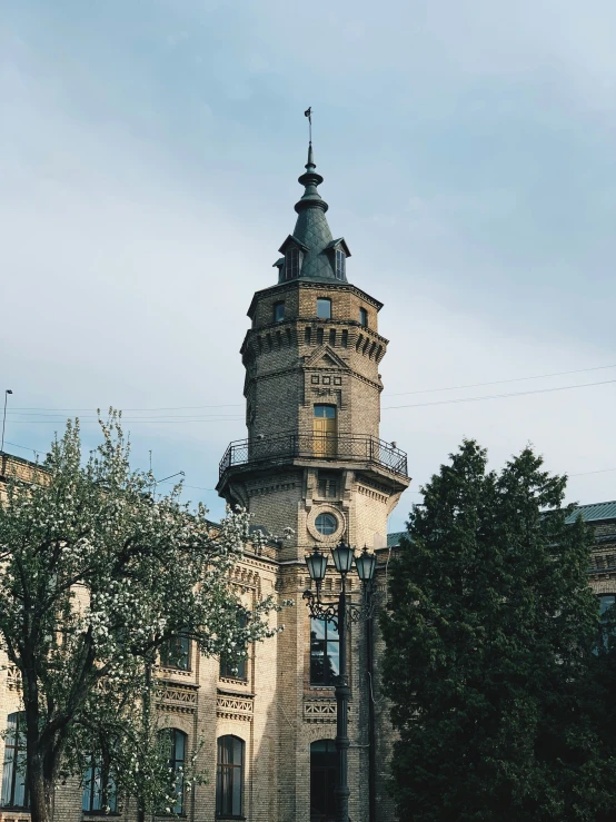 an old tower with a clock displayed on the side