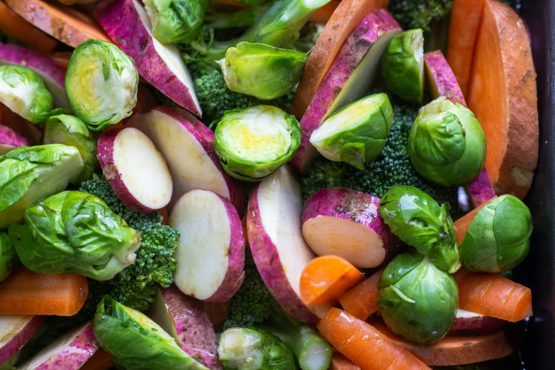 fresh vegetables mixed together in a dish for cooking