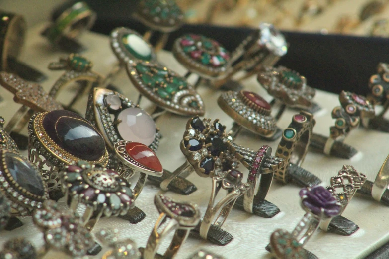 a collection of various ring styles on display