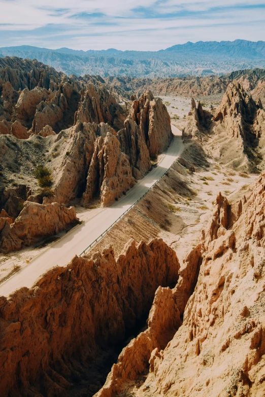 the mountains covered with dirt are in a desert