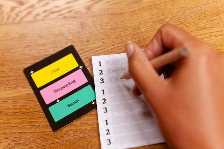 someone doing homework with sticky notes on the table