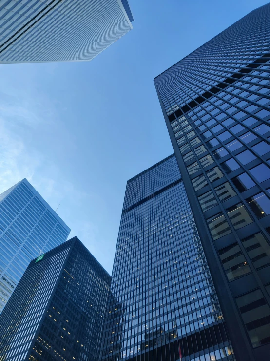 high rise skyscrs against a blue sky background