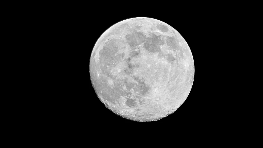 a full moon that is seen on the sky