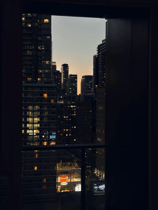 looking at the city lights through a window