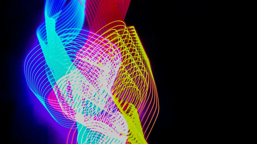 a multi colored image of curved lines with light from different lens sources