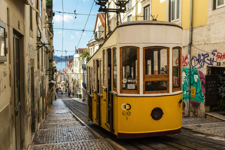 an old trolley going down the street in europe