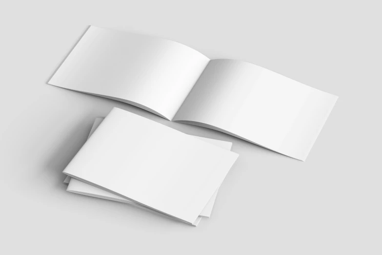 three blank white paper sheets on a gray background