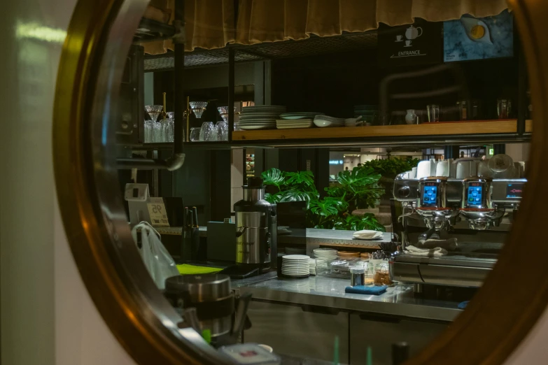 a kitchen that has a mirror in it