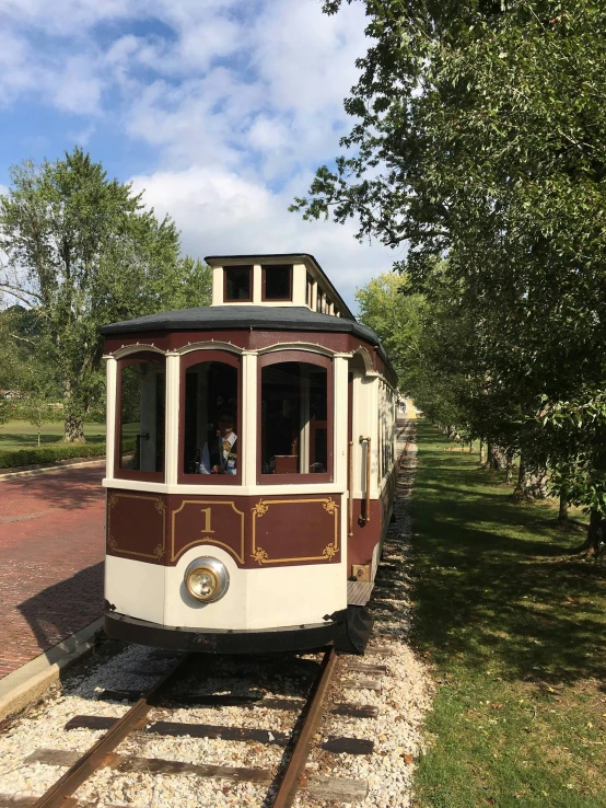 an old fashion train is traveling through the countryside