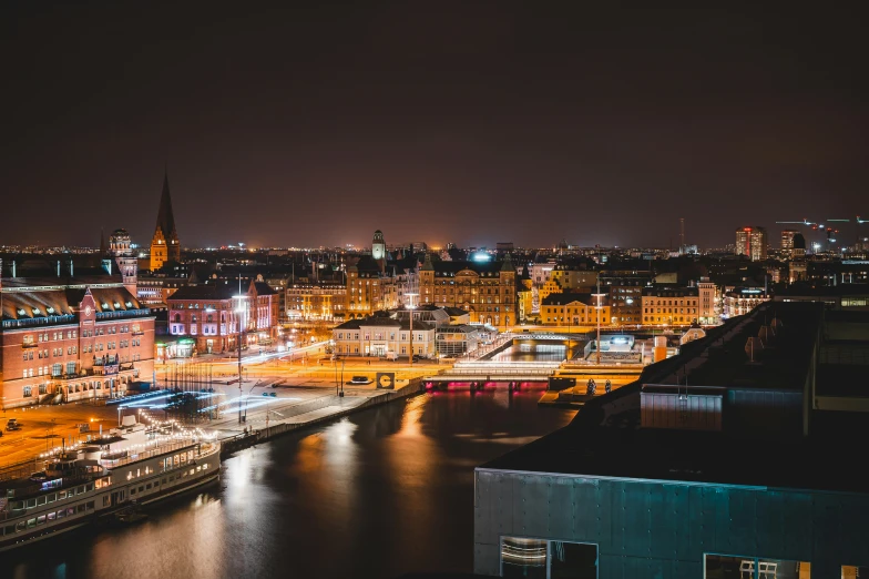 a city is lit up with lights at night