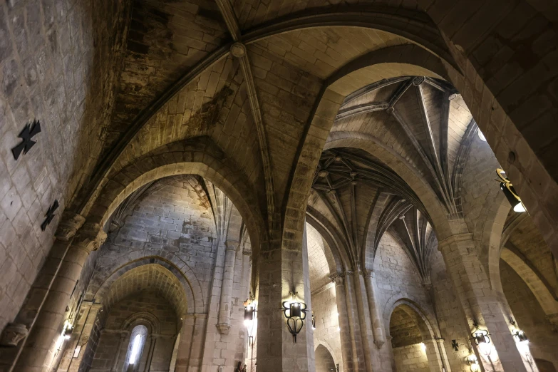 the interior of a cathedral with a cathedral bell