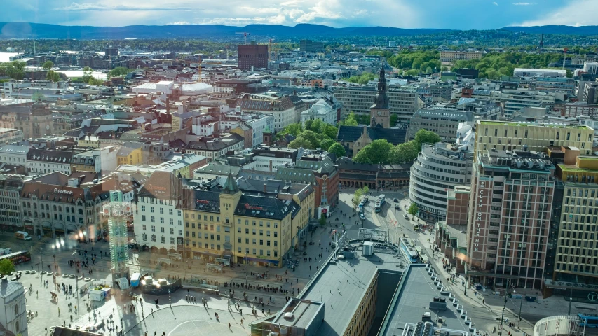 aerial view of the buildings of city with cars