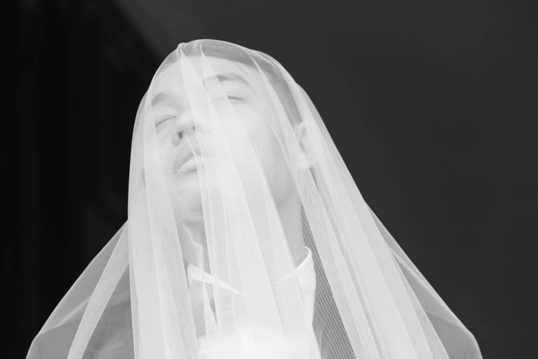 a black and white po of a bride's veil