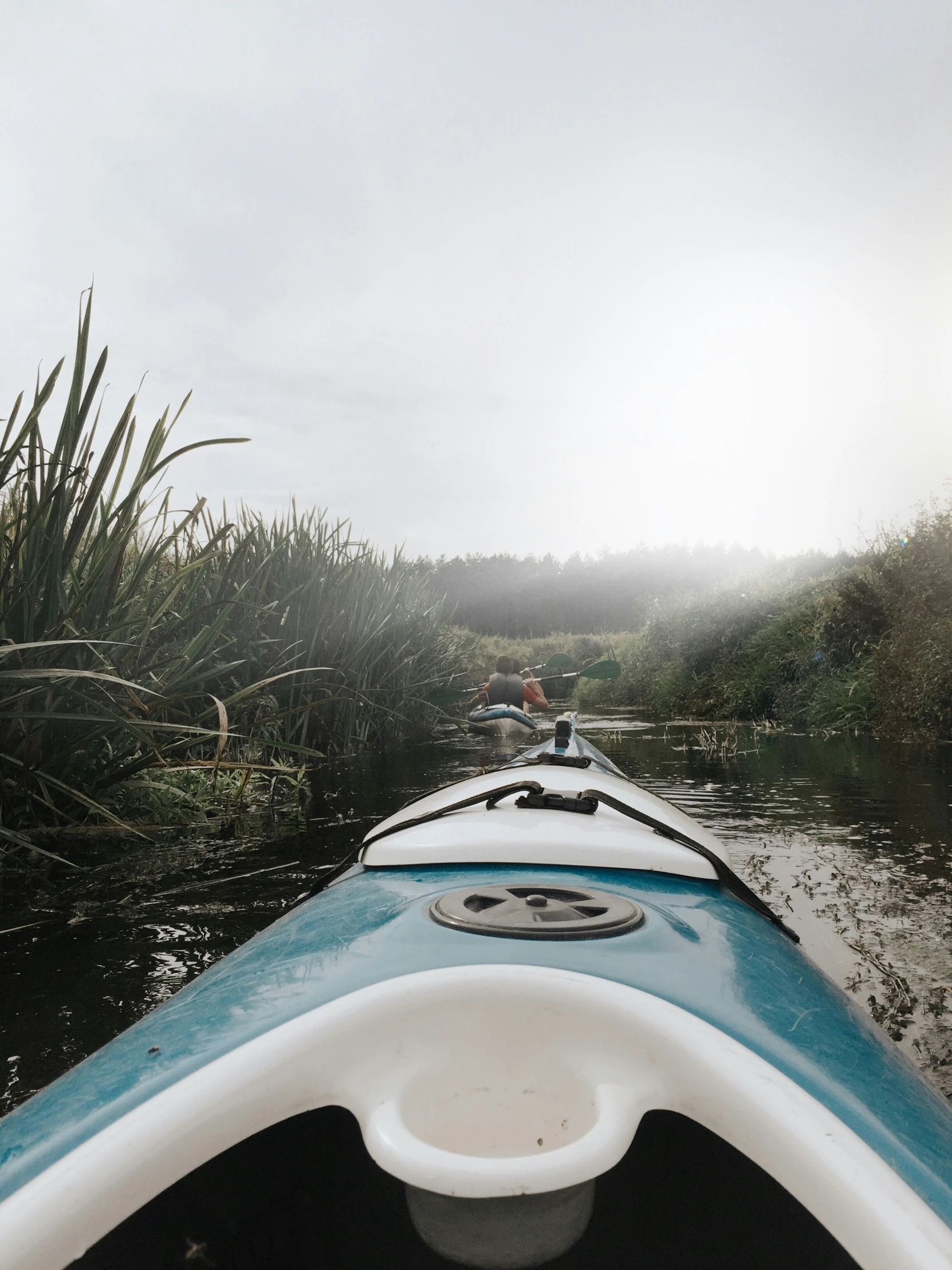 canoes and rafting going down a river