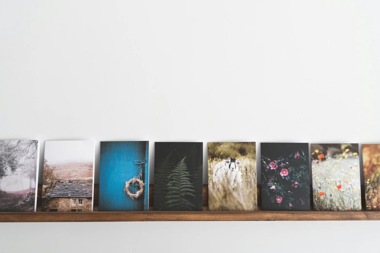 six different types of greeting cards on a shelf
