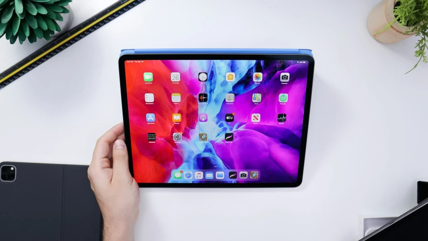 the ipad is displaying a colorful display on its back