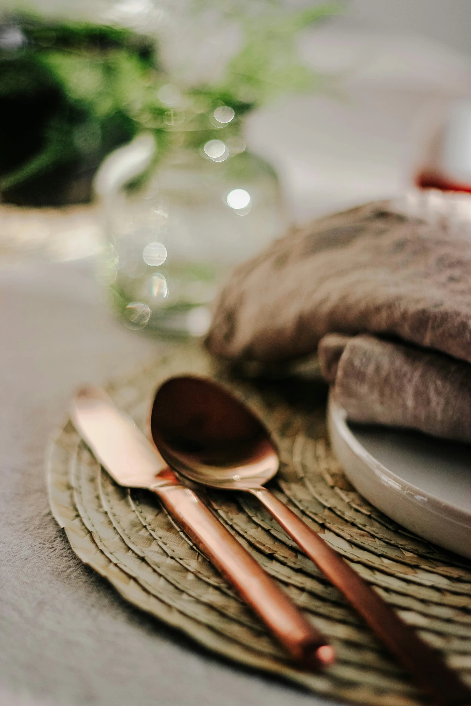 a wooden spoon sitting next to a table