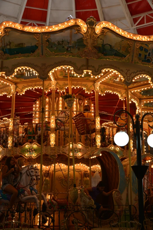 a carousel with a lot of lights all over it