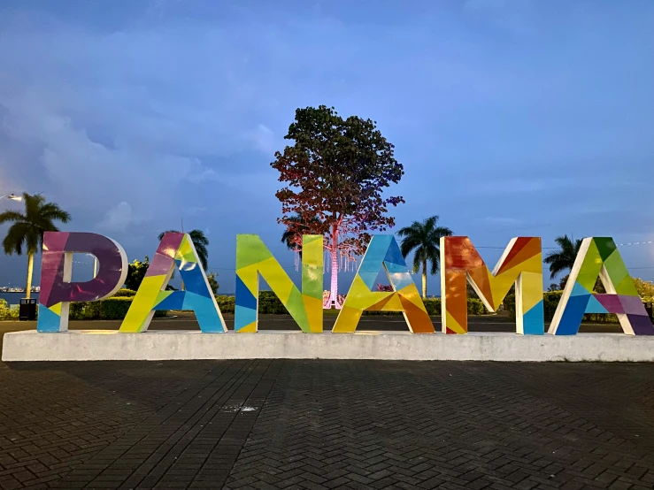 a very large sign with the words panorama written in multicolored letters