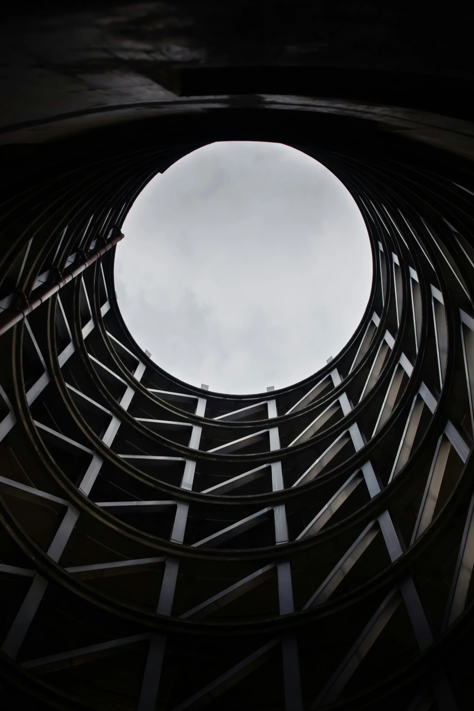 looking up at the sky through a circular hole