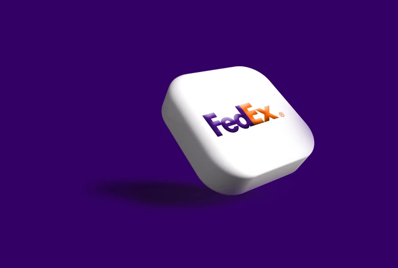 a white plastic toy that has the word fedex spelled on it