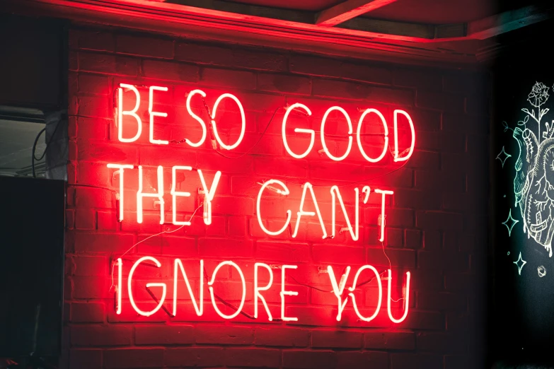 a neon sign that says, be so good they can't ignore you