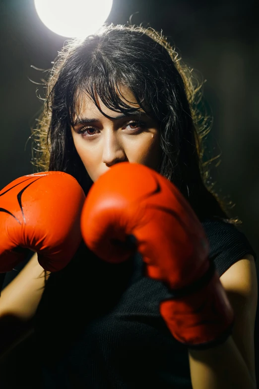 a girl is getting ready to fight