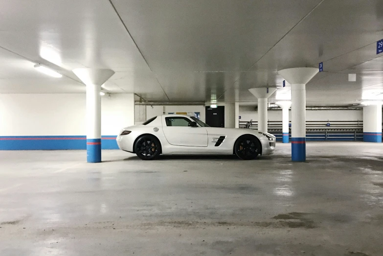 a white car parked in a parking space