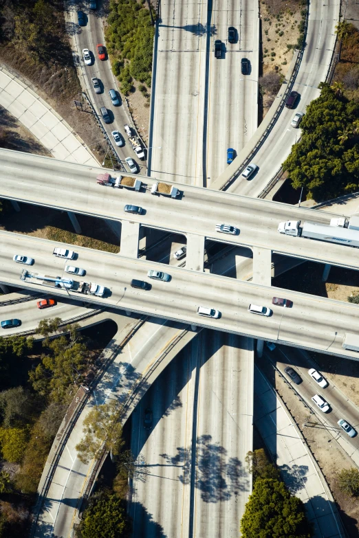 a large overhead highway intersection with lots of traffic on it