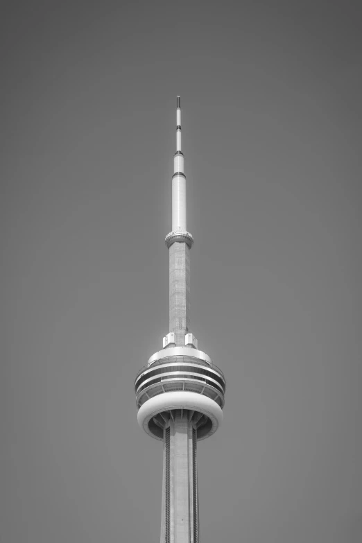 a tall white building towering into the air