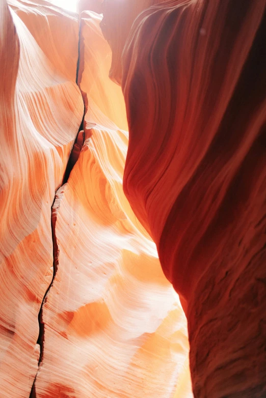 a person walking through some sand canyons