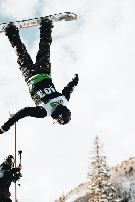 a person doing tricks on skis in the air