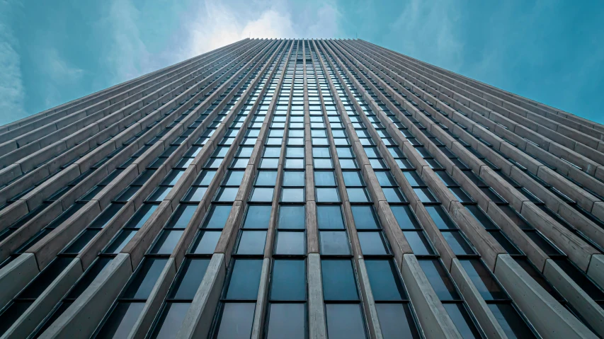 the side of a tall building as viewed from below