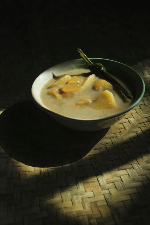 a bowl of food that has some soup in it