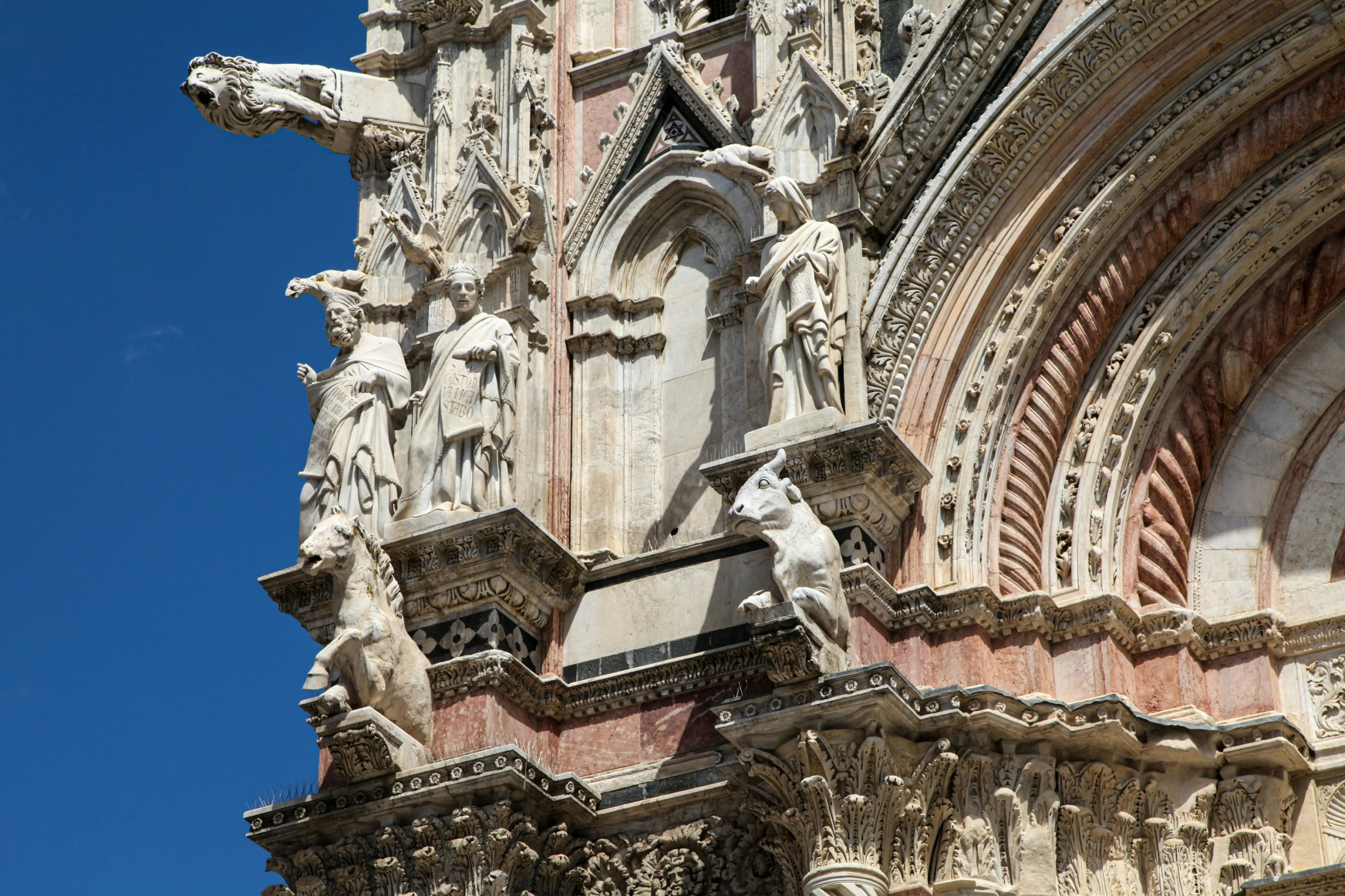 the view of a stone clock tower