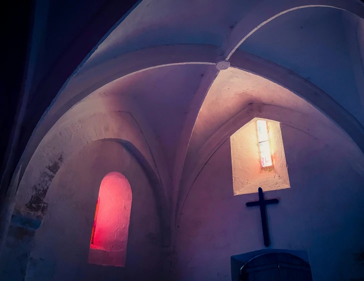 a church's interior, with light streaming through the windows