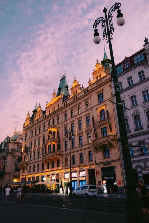 a group of buildings that have lights on each of them