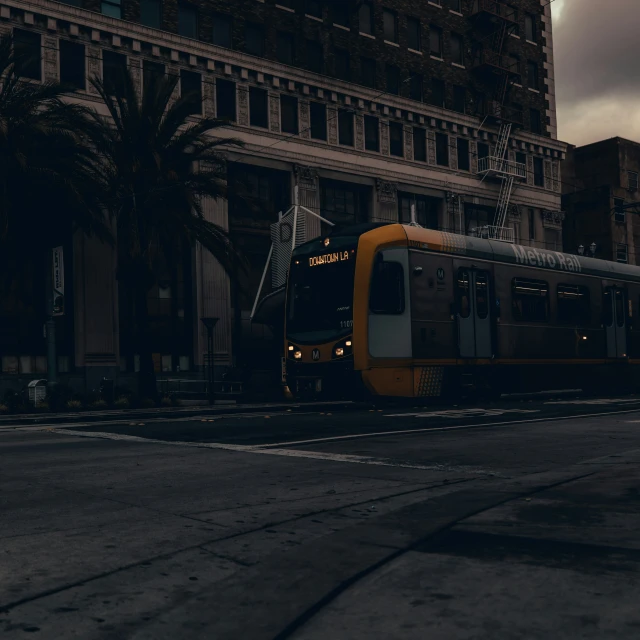 a street in front of a building with a tram in the foreground