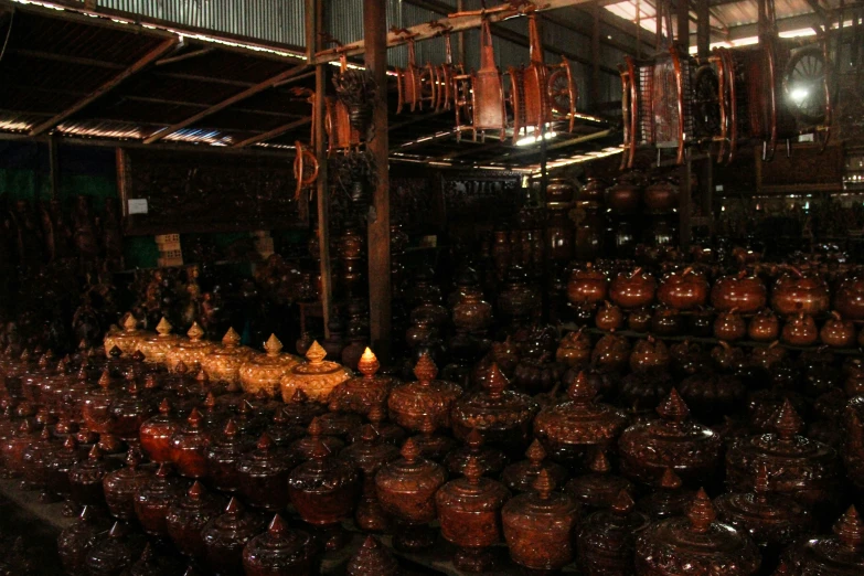 vases and other items on display in a market